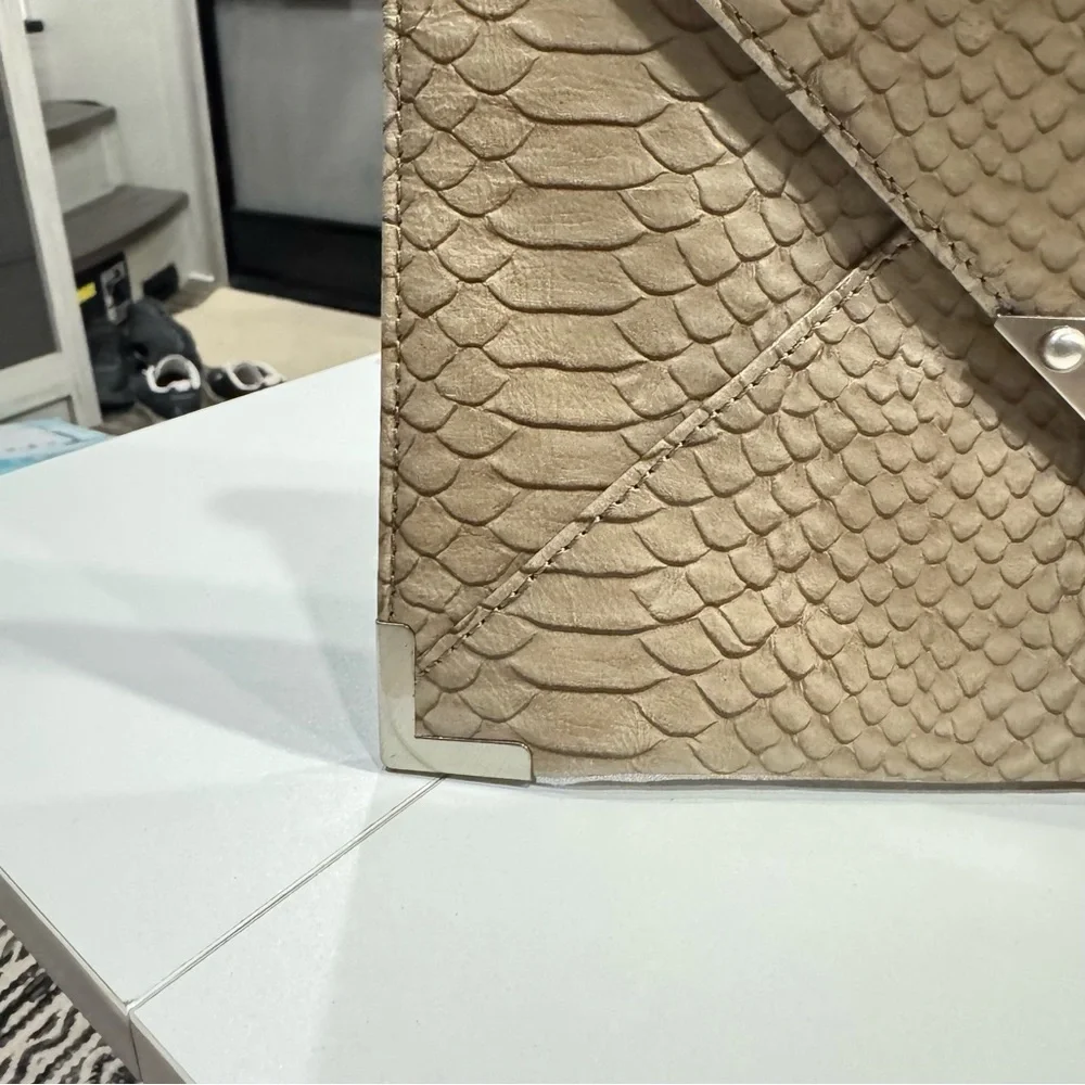 Tarnish Leather envelope-style clutch snakeskin texture, silver-toned hardware